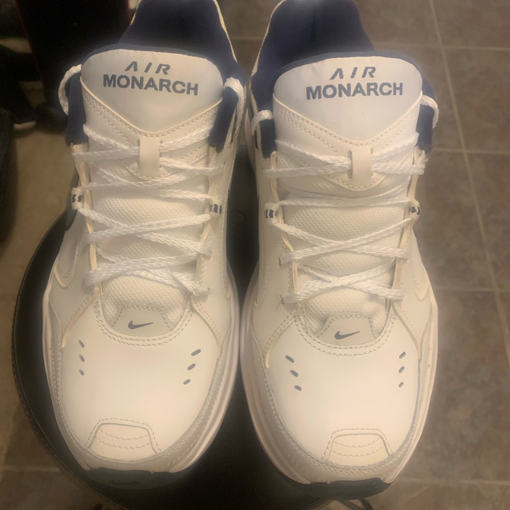 Nike air monarch  white and blue sneakers men size 9 in great condition .
